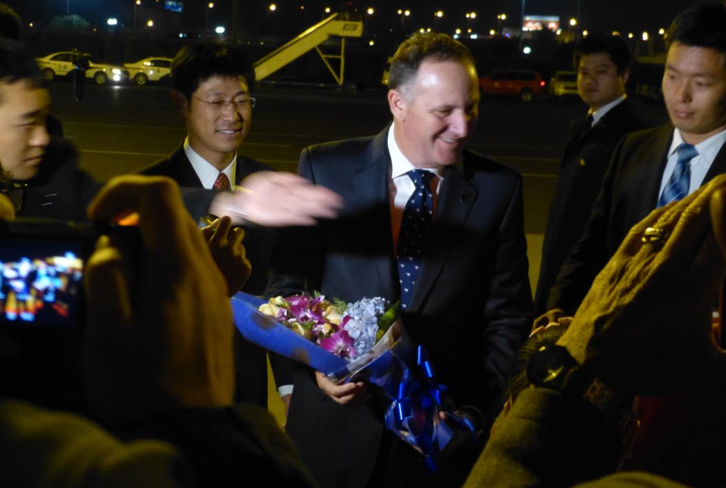 John Key welcomed on arrival.