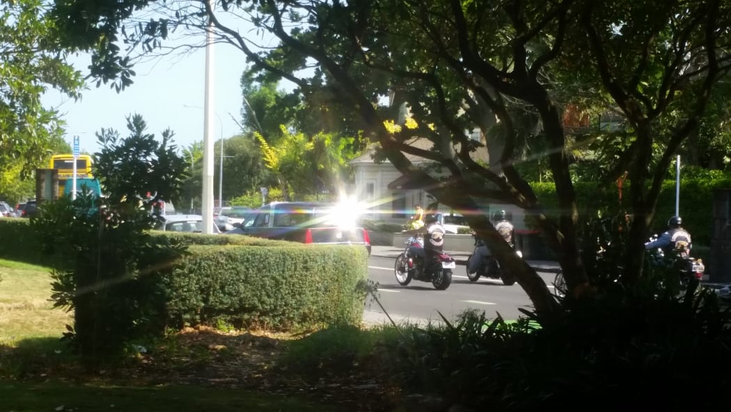 A hearse carrying colourful defence lawyer Eb Leary is escorted from St Mary's Church in Parnell by patched gang members on motorbikes, following a moving service on 12 February 2016.