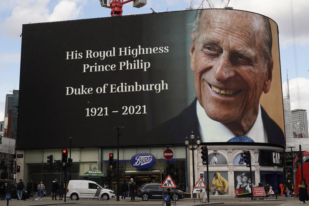 The electronic billboard at Piccadilly Circus displays a tribute to Britain's Prince Philip, Duke of Edinburgh in central London on April 9, 2021 after the announcement of the duke's death.