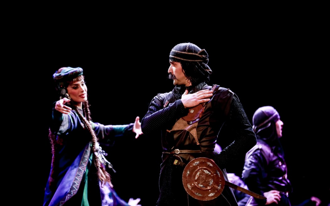 In Parikaoba, a warrior’s gesture of respect meets a woman’s gaze