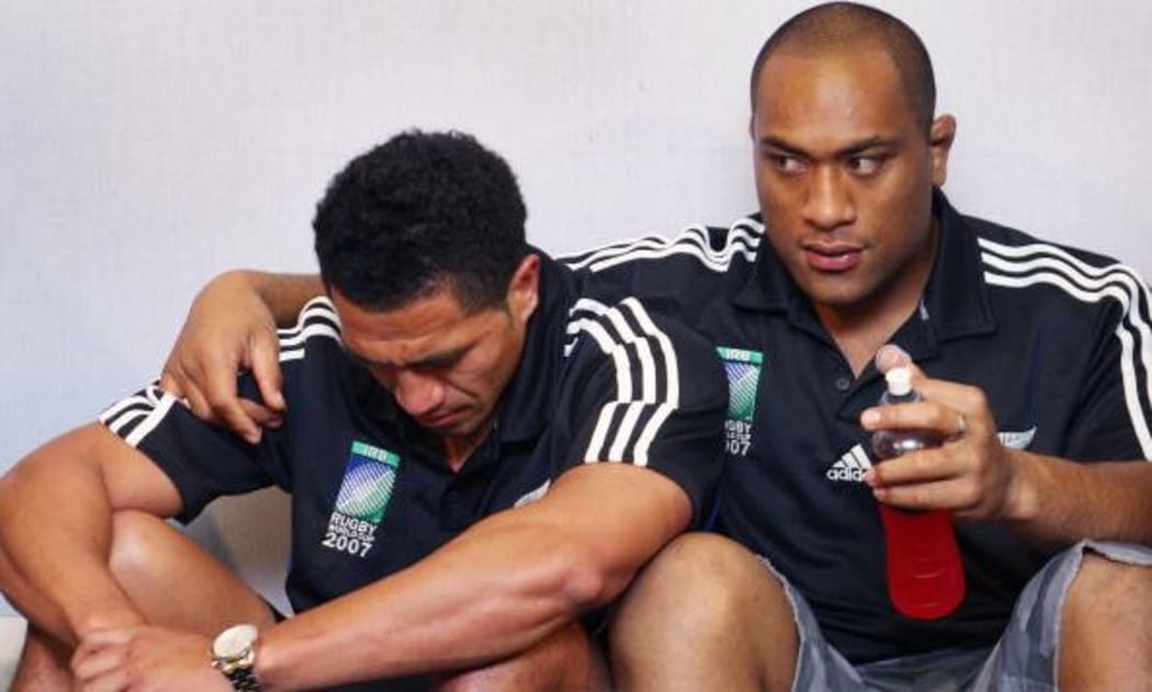 Neemia Tialata comforts Mils Muliaina after the All Blacks 2007 World Cup quarterfinal loss to France.