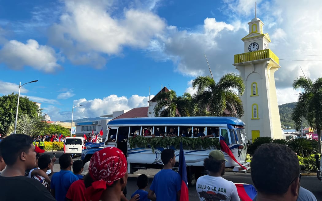 Toa Samoa fans celebrate in Apia ahead of Rugby League World Cup final against Australia on 20 November.