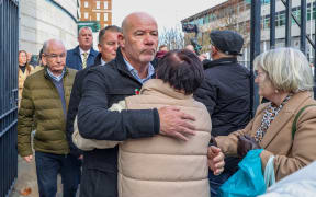Mickey McKinney (L), and John McKinney (C), brothers of Bloody Sunday victim William McKinney, react outside Belfast Crown Court in Belfast, Northern Ireland on October 23, 2025, following the "not guilty" verdict in the case against Soldier F. A judge in Belfast on Thursday acquitted a British ex-paratrooper of killing unarmed civilians during the 1972 Bloody Sunday massacre. Judge Patrick Lynch told the court he was "satisfied that the soldier or soldiers who opened fire... did so with the intention to kill" but that the prosecution "cannot establish by whose hand the fatal shots were fired, nor those that wounded" others. "I find the accused not guilty on all seven counts," he said, acquitting him of two charges of murder and five of attempted murder during one of the most difficult events of the three-decade "Troubles" that plagued Northern Ireland.