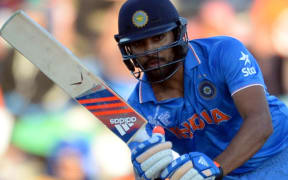 Rohit Sharma struck the highest score by a visiting batsman against Australia, surpassing Viv Richards's but it still wasn't enough to take his side to victory.
