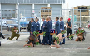 The bodies are welcomed home at the Ōhakea Airforce Base.