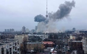 This handout picture released on the Facebook page of the Ukrainian Interior ministry  on March 1, 2022 show the smoke after a missile attack targeting the Ukrainian capitals television centre in Kyiv.