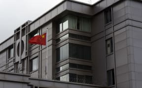 The Chinese flag flies outside the Chinese consulate in Houston after the US State Department ordered China to close the consulate in Houston on 22 July 2020.