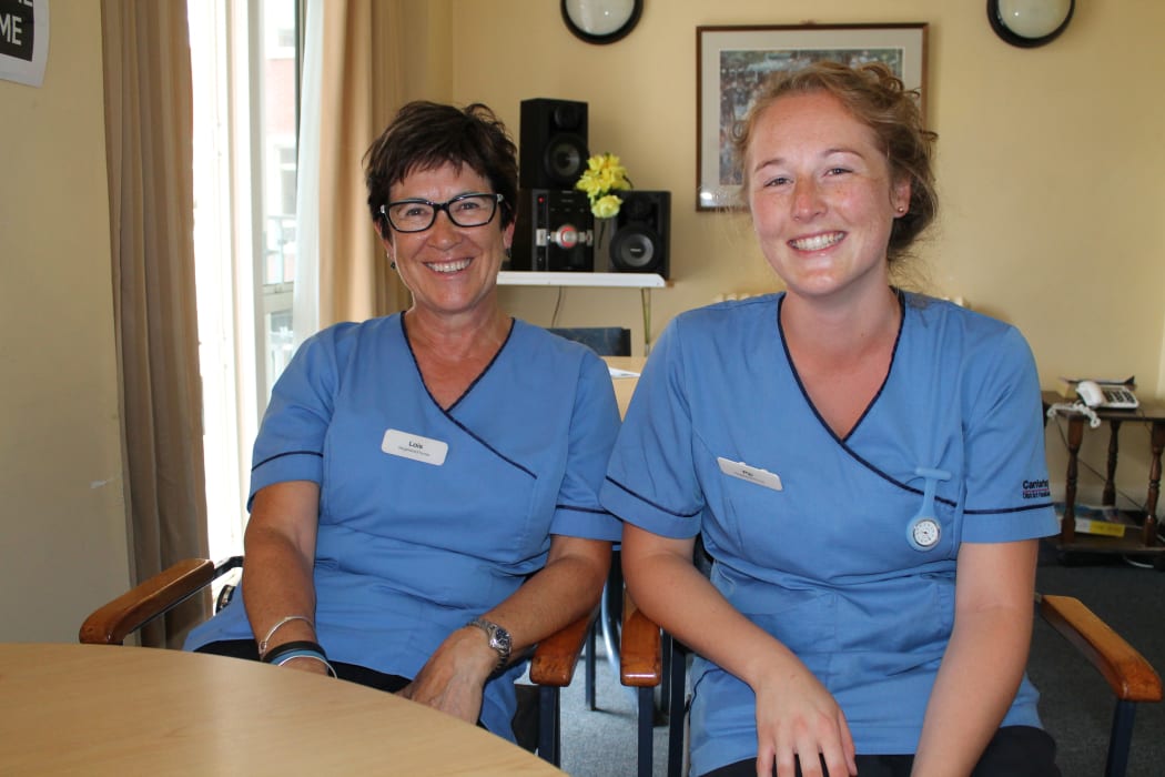 A photo of registered nurses, Lois Robertson (left) and Pip Hyde who say they see the benefits clown doctors bring to their patients