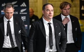 New Zealand All Blacks assistant coach Scott Hansen followed by assistant coach Leon MacDonald and New Zealand coach Scott Robertson.