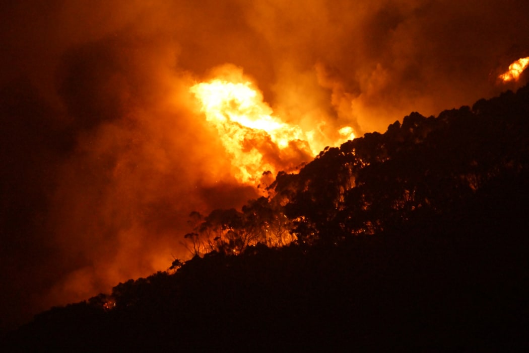 A photo taken on Christmas day of an out-of-control bushfire at Wye River which flared along Victoria's Great Ocean Road.
