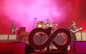 Wellington 22-year-old Taylor Johnston hits the drums for The Killers on stage in Auckland.