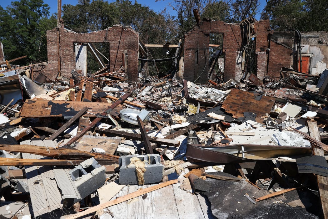 An exploded restaurant is seen with all debris after heavy rain and storm from remnants of Hurricane Ida in Manville, New Jersey, United States on 7 September, 2021.
