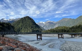 The Waiho (Waiau) River and State highway bridge at Franz Josef Glacier. The stopbank to the left is to be raised and extended 2.5km.
