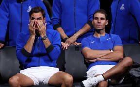 A emotional Rodger Federer with Rafael Nadal after he says goodbye to tennis as he retires, 2022.