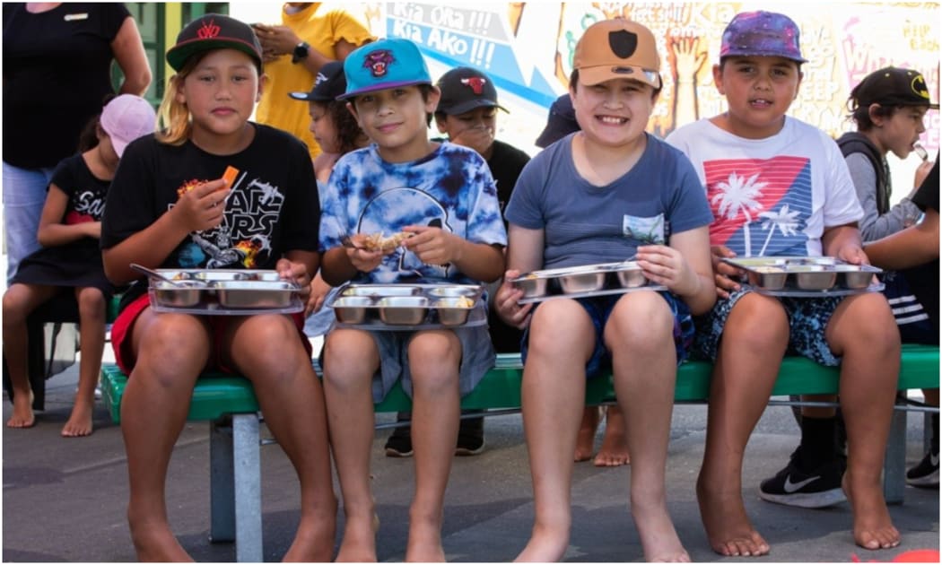 Flaxmere Primary School students enjoying a school lunch.
