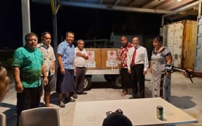 The official handover of 90,0000 doses of the Sinopharm vaccine from China to Kiribati. (L to R, MPs Koraubati Remuera, Moannata Ientaake, Batoromaio Kiritian, Tinte Itinteang (Health Min), MP Betero Atanibora, HE Tang Songgen and Ms Saitofi Miika ( Health Secretary).