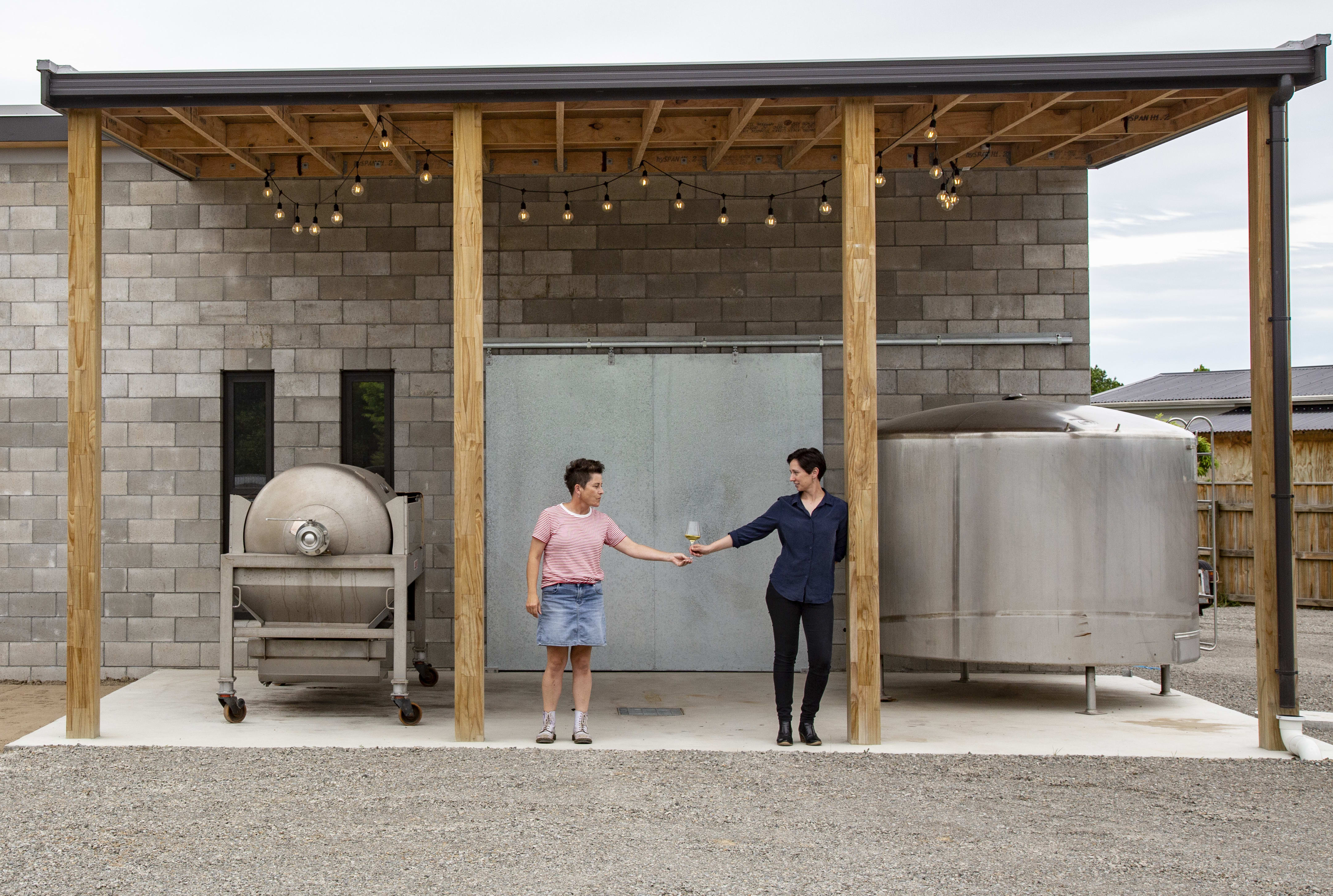 Alexia Winemaker Jane Cooper and her wife Lesley Reidy at their purpose-built urban winery in Greytown.