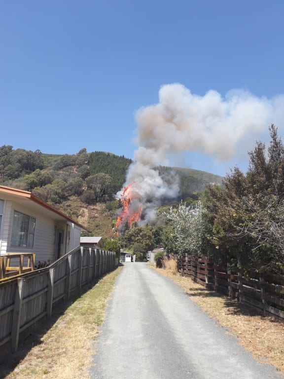 The view from Fresh FM as fire on Walters Bluff near Nelson erupts.