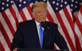 WASHINGTON, DC - NOVEMBER 04: U.S. President Donald Trump speaks on election night in the East Room of the White House in the early morning hours of November 04, 2020 in Washington,