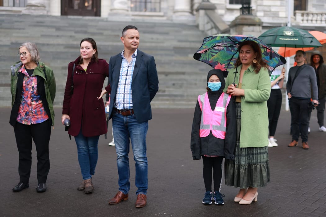 Green Party MPs Eugenie Sage, Julie Anne Genter, with co-leader and Climate Minister James Shaw, and co-leader Marama Davidson, at the steps of Parliament to hear from the gathered climate change protesters.