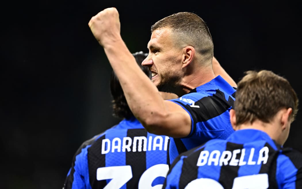 Inter Milan's Bosnian forward Edin Dzeko celebrates