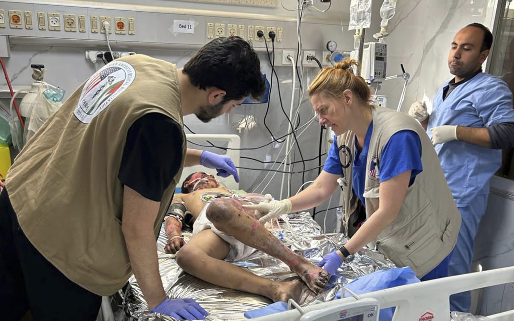 Monica Johnston RN, Burn and wound care nurse from Portland Oregon with the PAMA Palestinian American Medical Association, monitors a patient who sustained major burns on May 8, 2024, Khan Younis, Gaza. A group of 35 foreign doctors on a volunteer mission to help at the hospital, including 22 Americans, have been trapped in Gaza by Israel’s seizure of the Rafah crossing into Egypt.