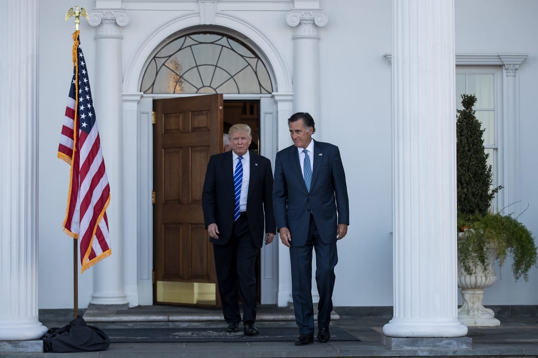 Donald Trump and Mitt Romney leave the clubhouse after their meeting at Trump International Golf Club in New Jersey.