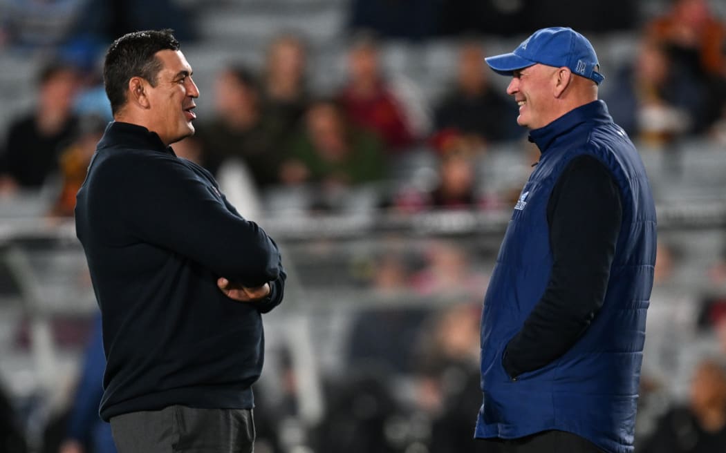 Chiefs coach Clayton McMillan and Blues coach Vern Cotter.