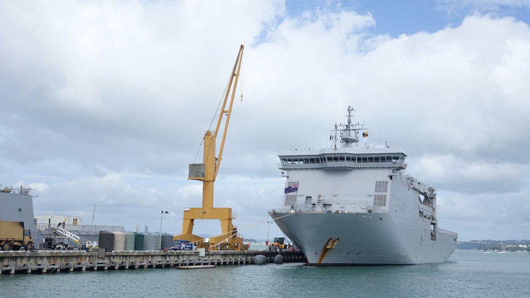 HMNZS Canterbury is being loaded at Devonport Naval base before heading to Fiji.