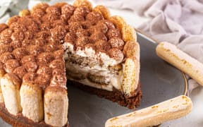 Tiramisu - an an Italian dessert known as 'pick me up' - is traditionally made with ladyfingers dipped in coffee, egg yolks, sugar, mascarpone, and cocoa powder.