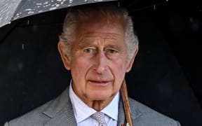 Britain's King Charles III looks on as he arrives to embark on HMS Iron Duke to attend a reception with the Bordeaux community and French/British military representatives, in Bordeaux, southwestern France, on September 22, 2023. Britain's King Charles III is to receive hospital treatment for enlarged prostate, Buckingham Palace announced on January 17, 2024.
