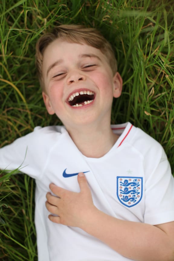 Prince George of Cambridge in the garden of Kensington Palace, in a photo taken by the Duchess of Cambridge to mark her son's sixth birthday.