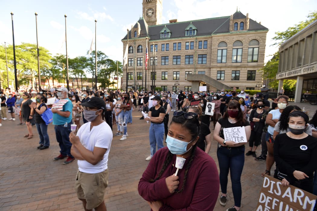 Media said hundreds of people peacefully protested against police brutality outside the police station in Lowell, Massachusetts.