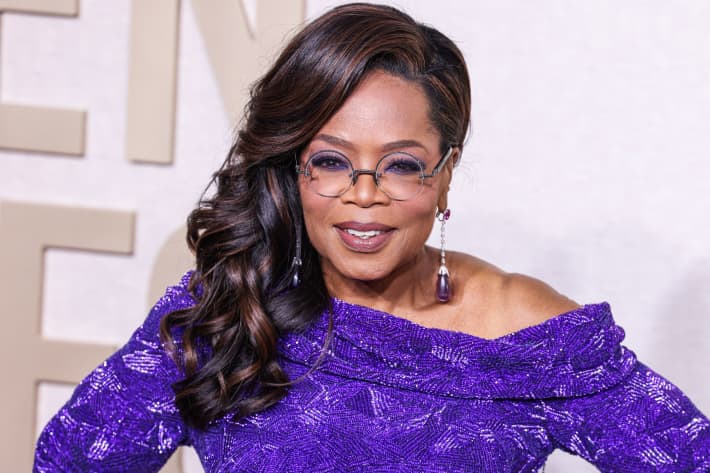 Oprah Winfrey wearing a Louis Vuitton dress, Manolo Blahnik shoes, and Chopard jewels arrives at the 81st Annual Golden Globe Awards held at The Beverly Hilton Hotel on 7 January, 2024 in Beverly Hills, Los Angeles, California, United States.