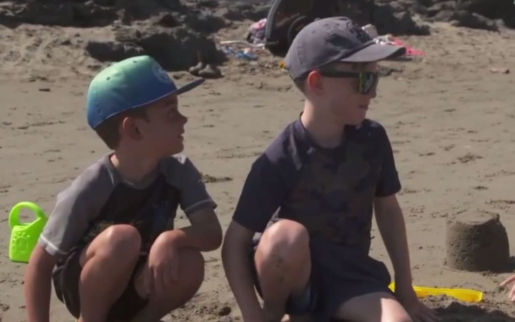Sam Kerr, left, and his brother, Nathan Kerr at Christuch's Sumner Beach