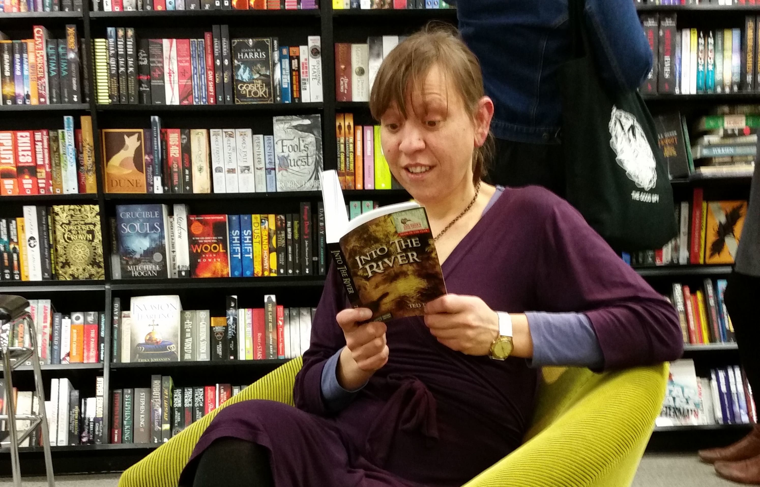 Karen McLeod reading Into the River in Wellington's Unity Book.