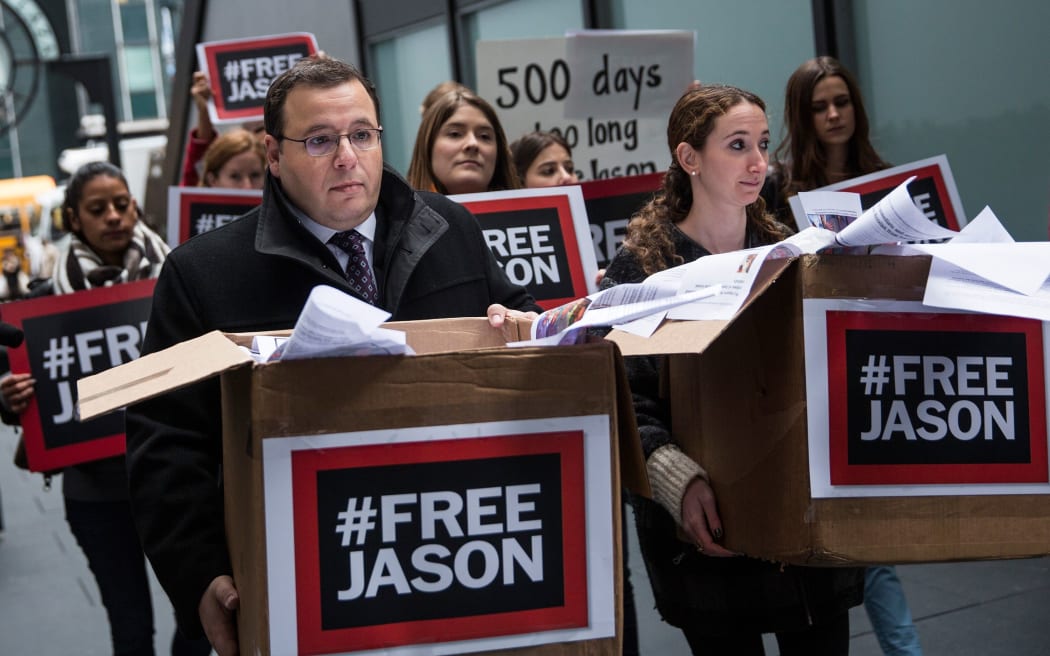 Ali Rezaian, the brother of Washington Post journalist Jason Rezaian, delivers a petition to the Iranian Mission to the United Nations on 3 December calling for his brother's immediate release.