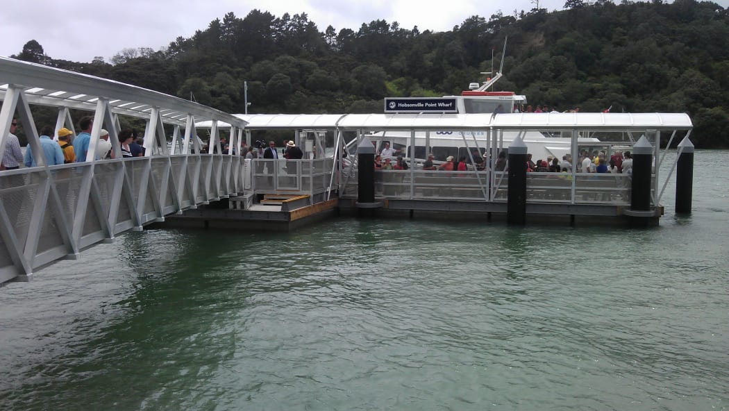 Public boarding for the opening-day free shuttle between the new Hobsonville Wharf and the new Beach Haven wharf.