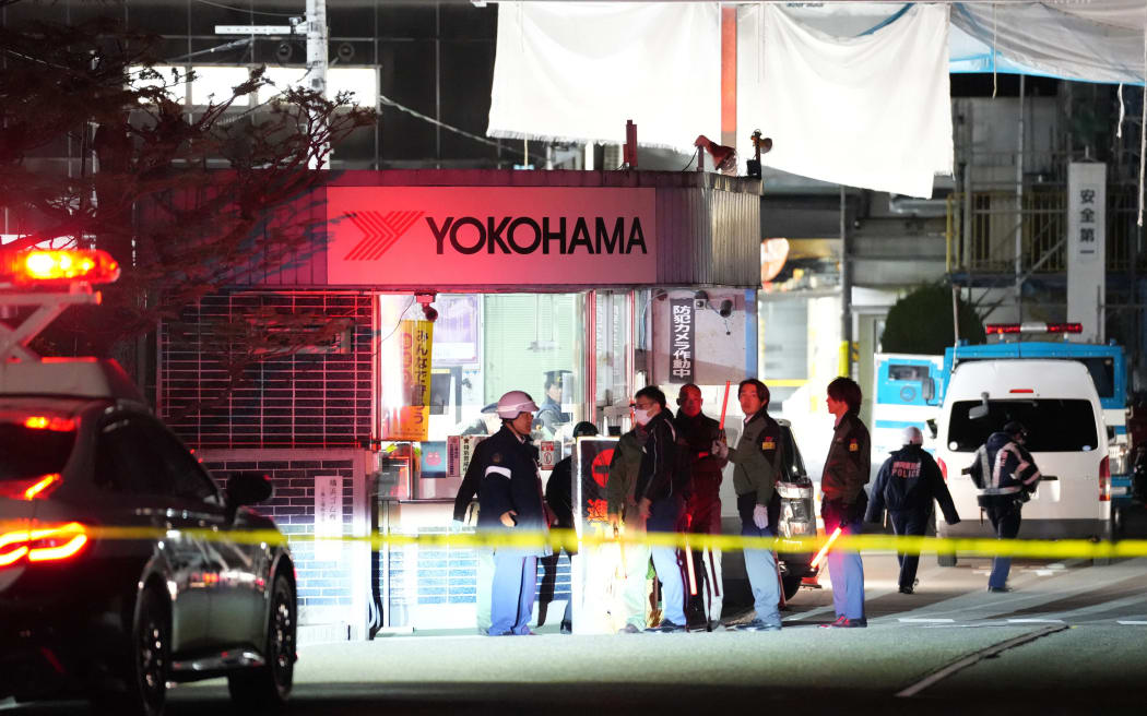 A photo shows the Yokohama Rubber Company Mishima Plant, where a stabbing incident occurred, injuring 15 people, in Mishima City, Shizuoka Prefecture, Japan, on December 26, 2025. At around 4:30 p.m. on the same day, 15 employees were injured, with 6 possibly sustaining serious injuries. The Shizuoka Prefectural Police arrested Masaki Oyama, a 38-year-old man, a self-proclaimed resident of Mishima City with an unknown occupation, on suspicion of attempted murder after he allegedly stabbed a male company employee with a knife inside the factory. According to investigative sources, the man was wearing what appeared to be a gas mask. Yokohama Rubber, headquartered in Hiratsuka City, Kanagawa Prefecture, and founded in 1917, primarily manufactures tires for passenger cars, construction equipment, and agricultural machinery. ( The Yomiuri Shimbun ) (Photo by Ryo Aoki / The Yomiuri Shimbun via AFP)