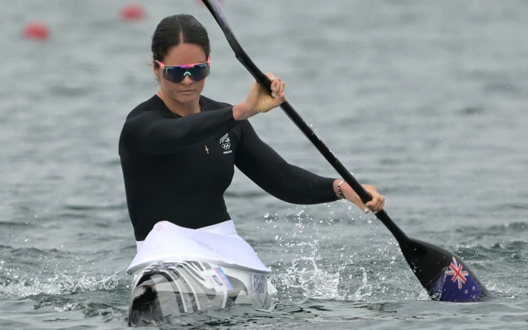 New Zealand's Aimee Fisher competes in the women's kayak single 500m heats canoe sprint competition at Vaires-sur-Marne Nautical Stadium in Vaires-sur-Marne during the Paris 2024 Olympic Games on August 7, 2024. (Photo by Bertrand GUAY / AFP)