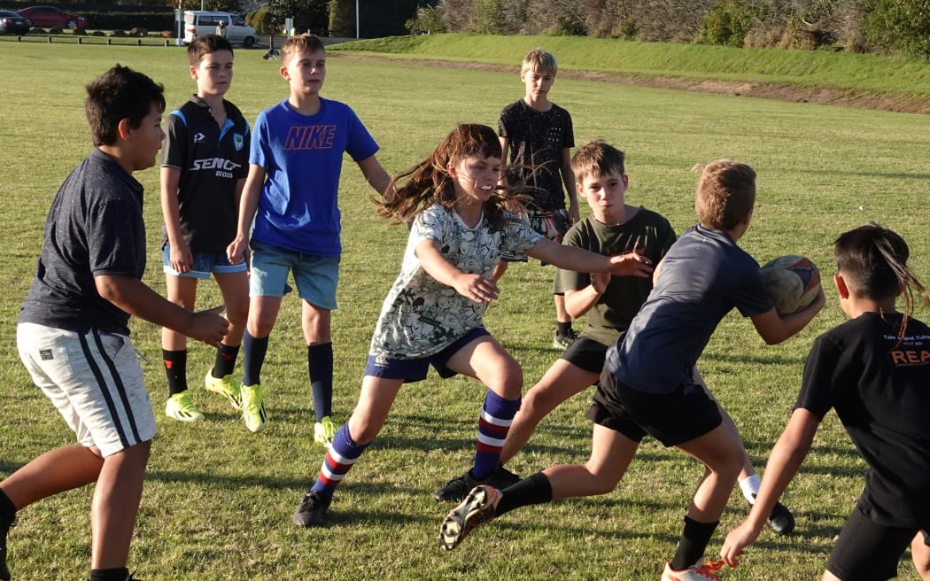 New Zealand’s best mullet in action during Kerikeri Under-11s rugby training.