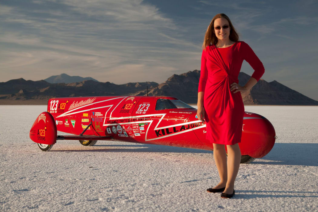 Engineer and racer Eva Hakansson with her motorcycle Killajoule, which holds the electric motorcycle speed world record.