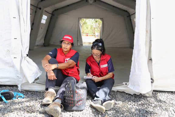 Red Cross Nurse and FACT Health Guru Dev Singh waits for supplies for the mobile medical clinic.