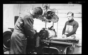 Denis Glover and John Drew at Caxton Press in 1934 shot by Jean Bertram