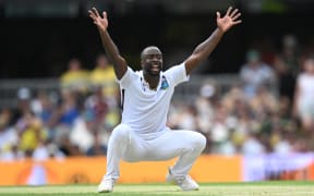 Kemar Roach of the West Indies celebrates the wicket of Steve Smith of Australia on day 2 of the second Test at the Gabba in Brisbane, January 26, 2024. (AAP Image/Darren England / www.photosport.nz)