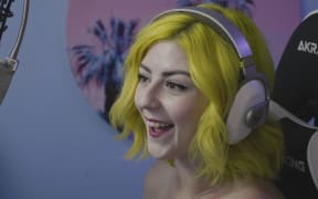 Lorien Gugich, aka Lorii Pops, has built a community of loyal followers, also known as a the "Pop Squad", who pay her to watch her play video games.