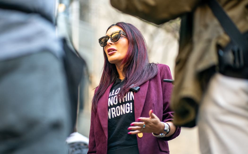 NEW YORK, NEW YORK - APRIL 15: Far-right activist Laura Loomer speaks to the media prior to the beginning of former President Donald Trump's Trial at Manhattan Criminal Court on April 15, 2024 in New York City. Jury selection is set to begin in the former president's criminal trial. Trump faces 34 felony counts of falsifying business records in the first of his criminal cases to go to trial. This is the first-ever criminal trial of a former president of the United States.   David Dee Delgado/Getty Images/AFP (Photo by David Dee Delgado / GETTY IMAGES NORTH AMERICA / Getty Images via AFP)