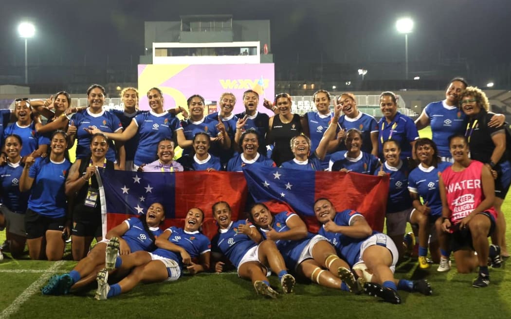 Manusima Samoa players celebrate following the WXV 3 2024 match between Samoa v Madagascar at The Sevens 2 Stadium on October 11, 2024 in Dubai, United Arab Emirates, as they qualify for the 2025 Women's Rugby World Cup.  Photo: Christopher Pike - World Rugby/World Rugby via Getty Images