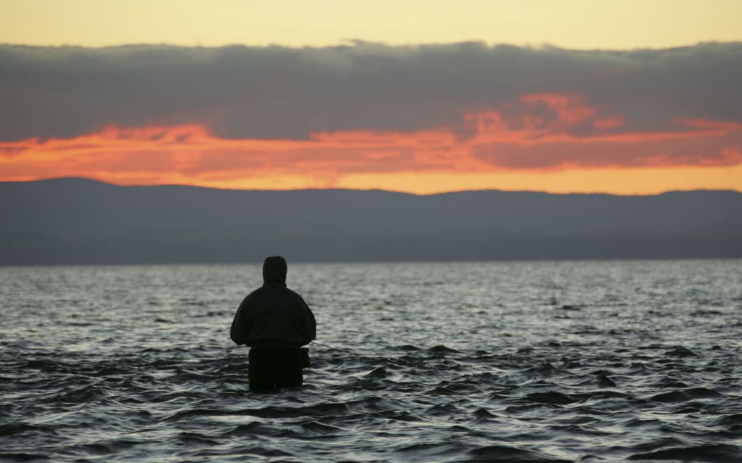 A fisher at Lake Taupo.