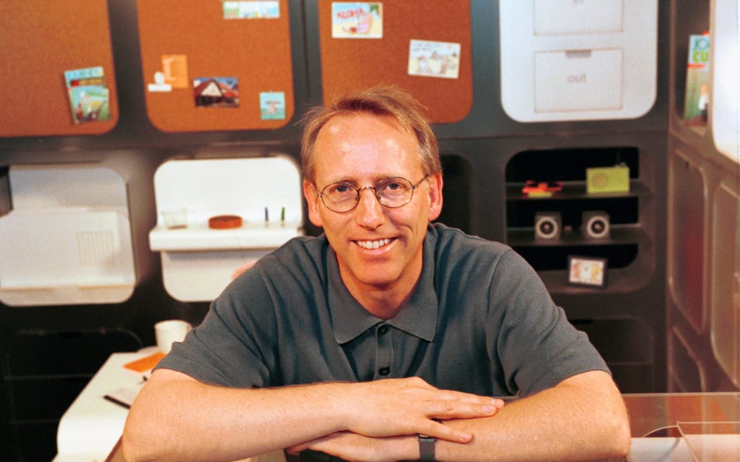 SAN FRANCISCO - AUGUST 28:  Scott Adams, famed creator of the comic strip DILBERT stands within "Dilbert's Ultimate Cubicle" which offers practical and humorous concepts for the future workplace office, Tuesday, August 28, 2001 in San Francisco, California. The cubicle- which includes a hammock, aquarium, rotating floor modules, shoe polisher and a self-timing guest seat - was designed by IDEO, a world leader of innovation and design and was created in response to the thousands of e-mails Adams has received from disgruntled workers across the country. (Photo by Bob Riha, Jr./Getty Images)